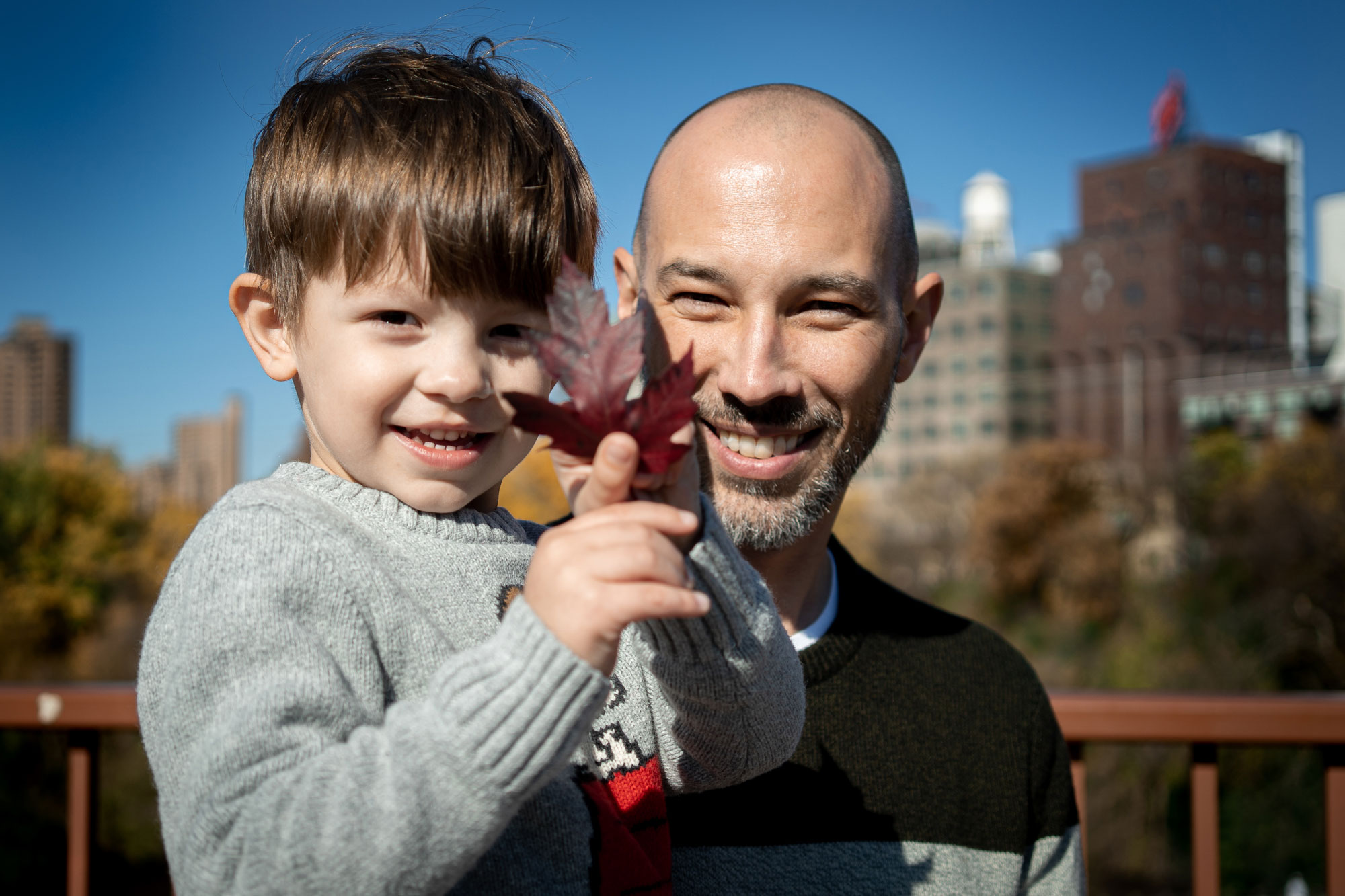 Dad holding boy