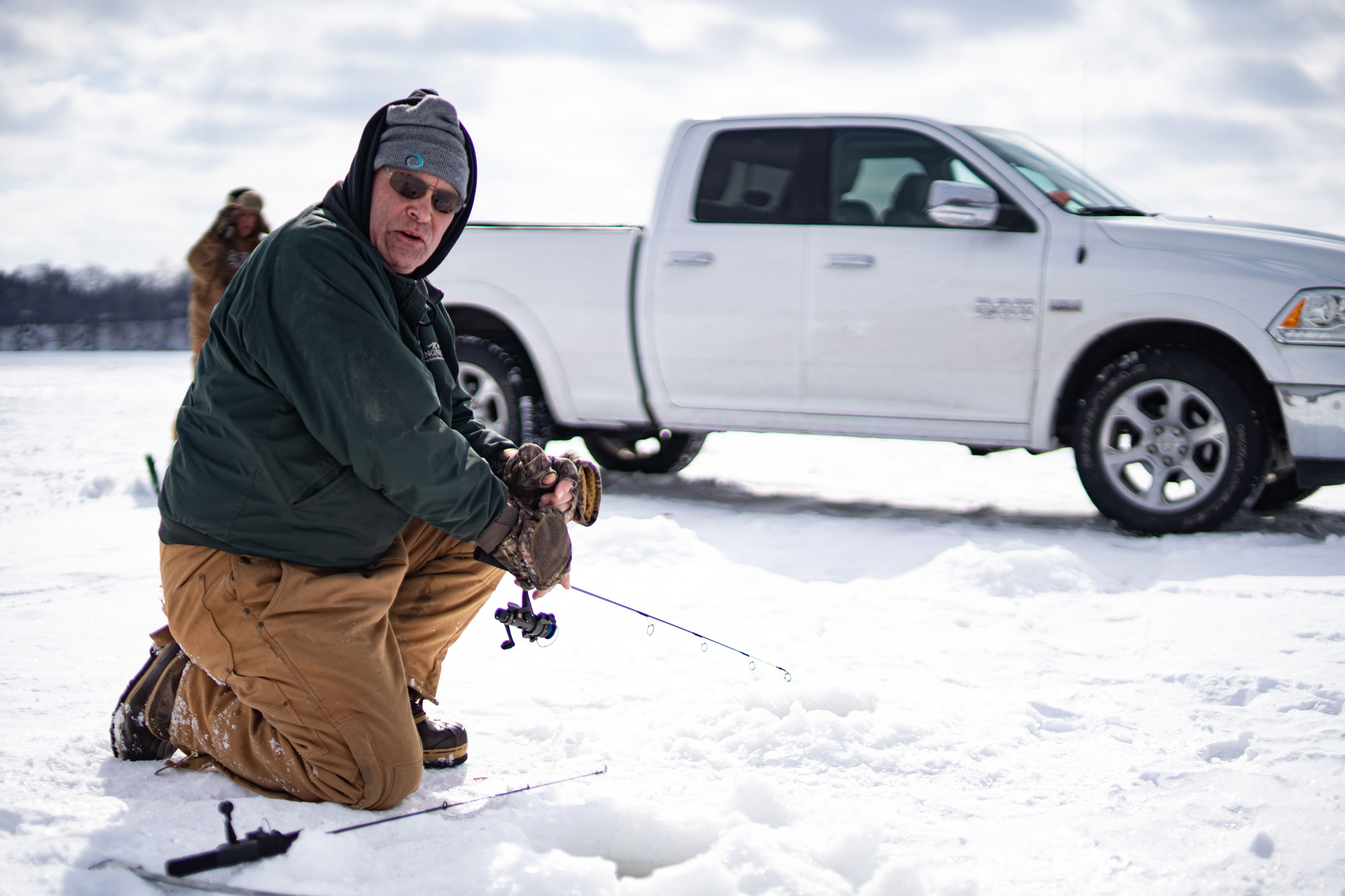 Man ice fishing