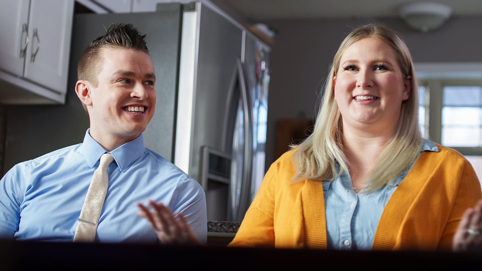 Man and woman smiling together