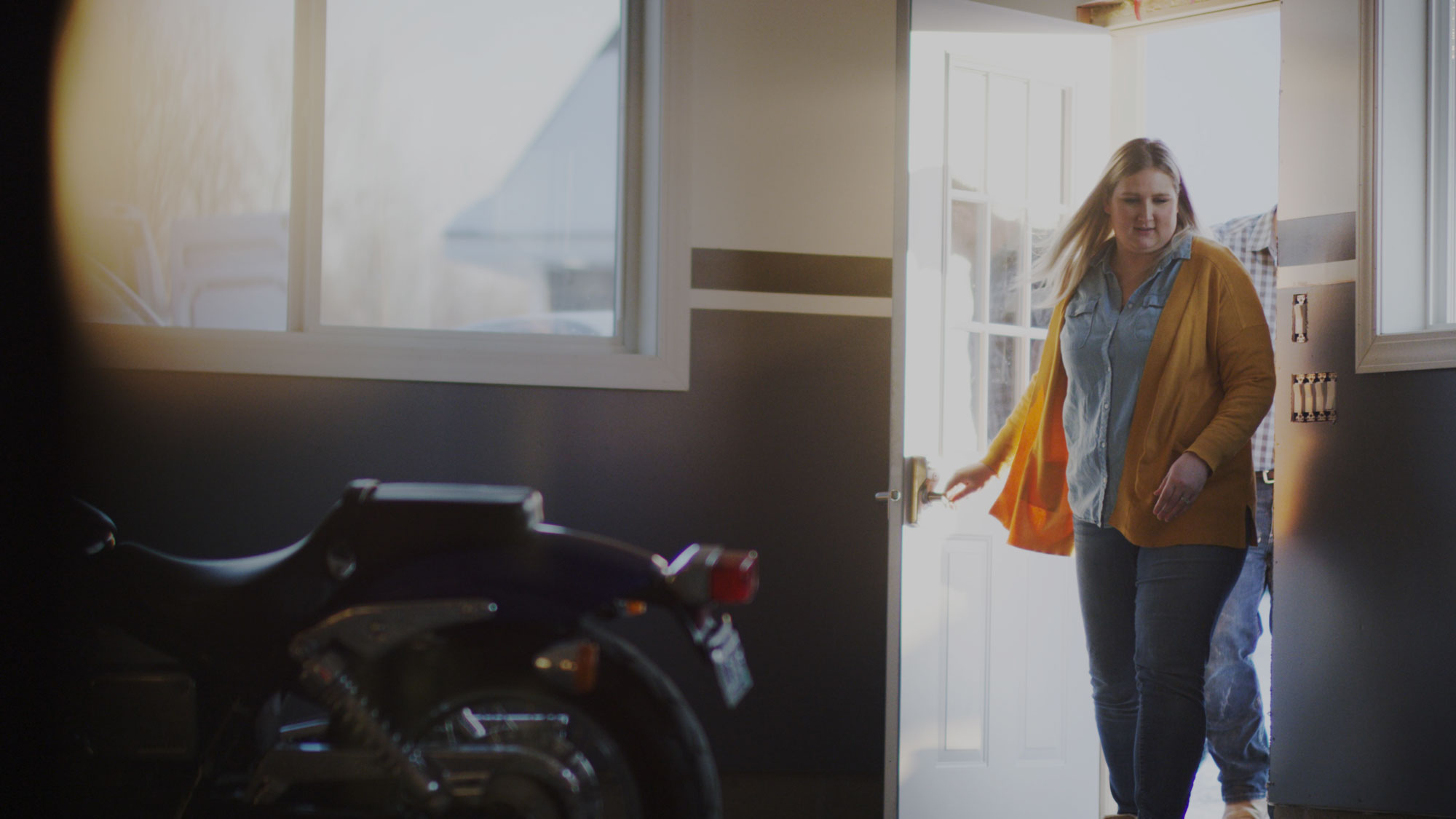 Couple entering home